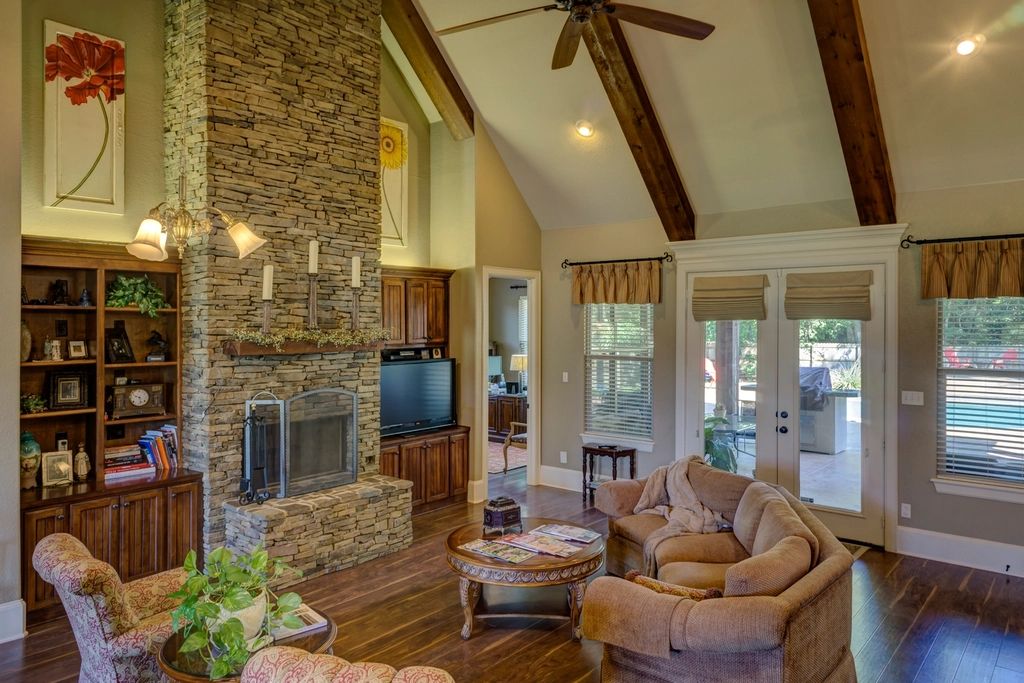 A suite sitting room with a sofa and armchairs